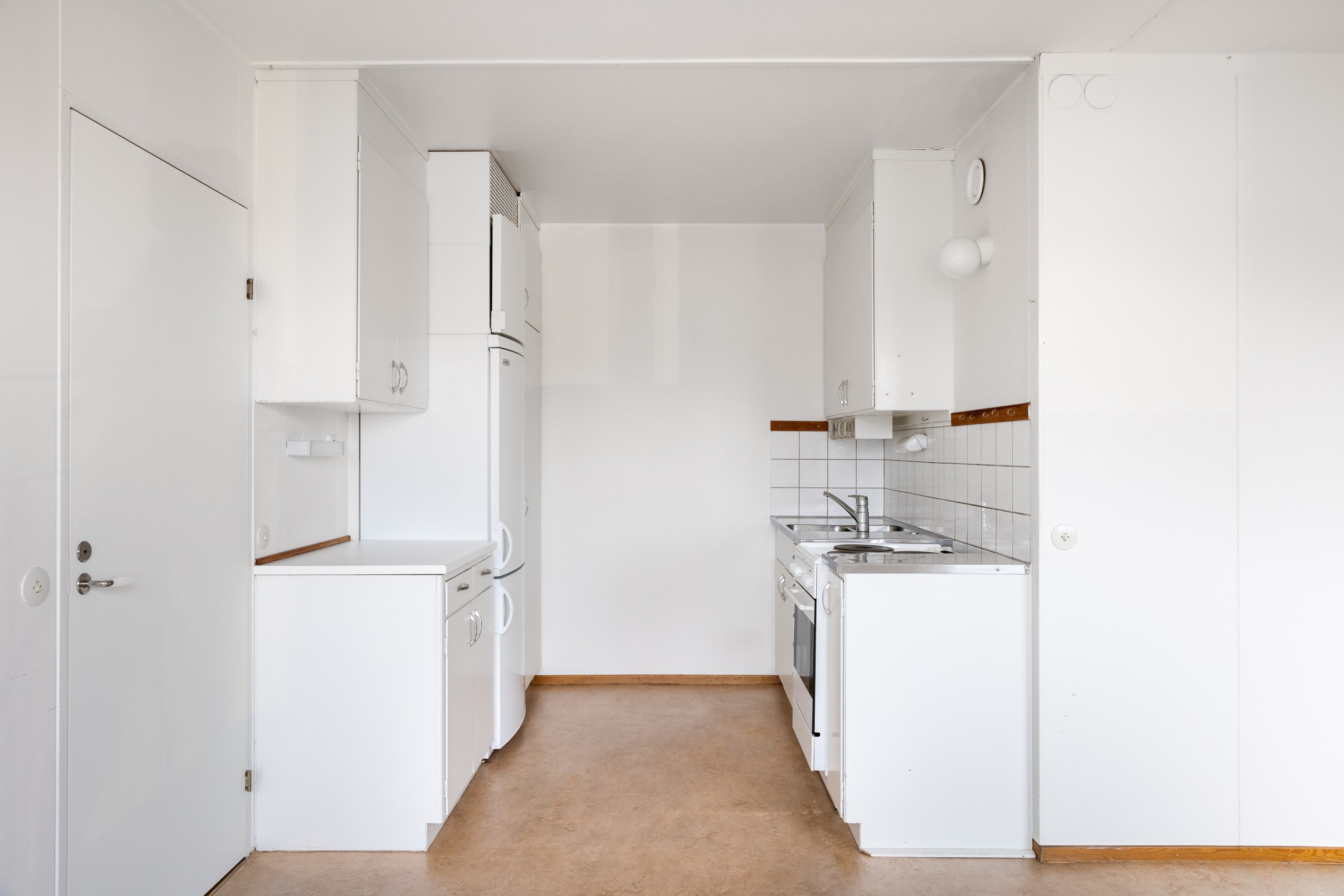 Funktionellt originalkök med uppdaterade vitvaror