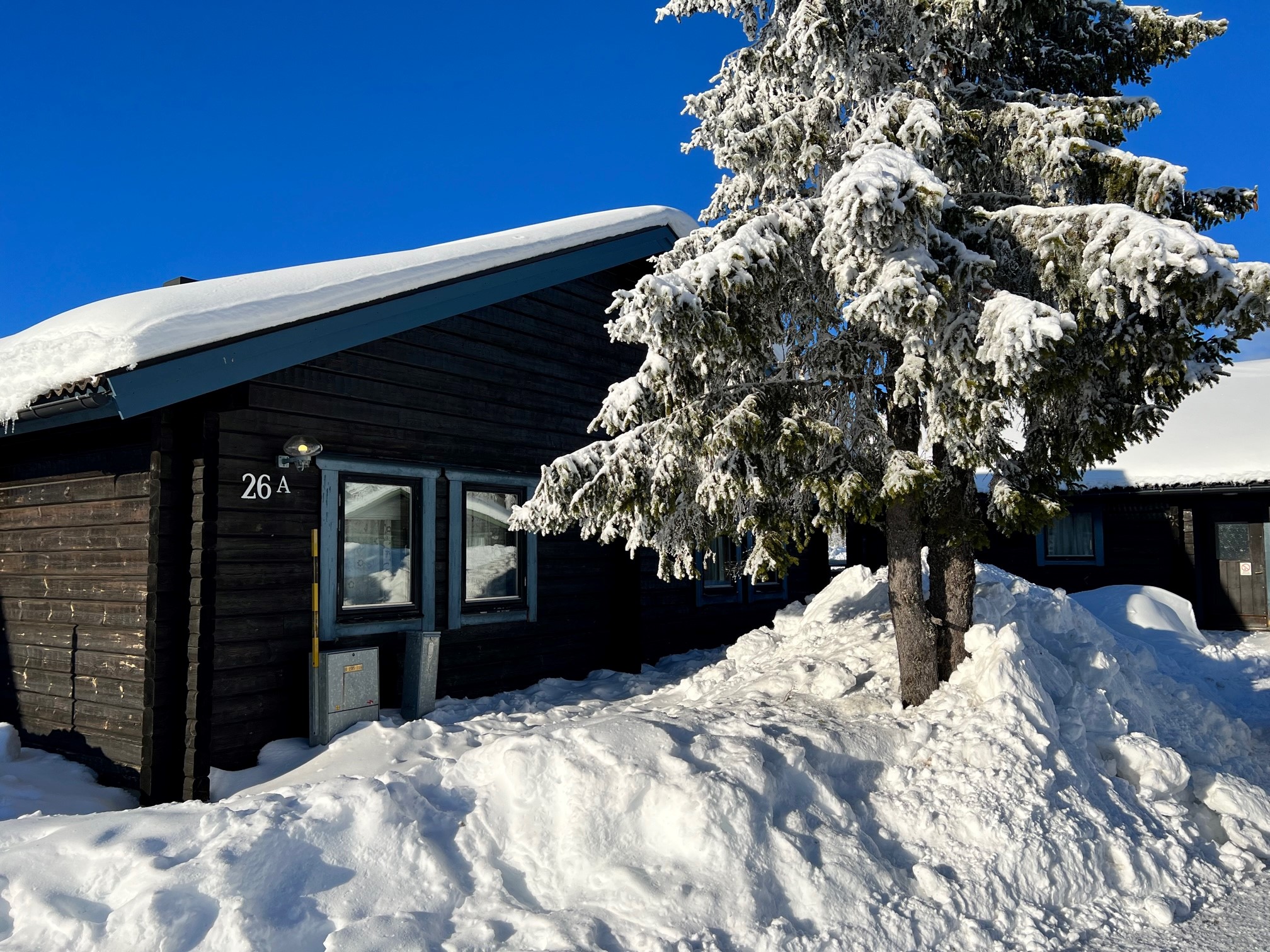 Riktig fjällstuga i timmer