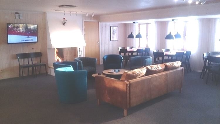 Fjällbyn Club House med eldstad