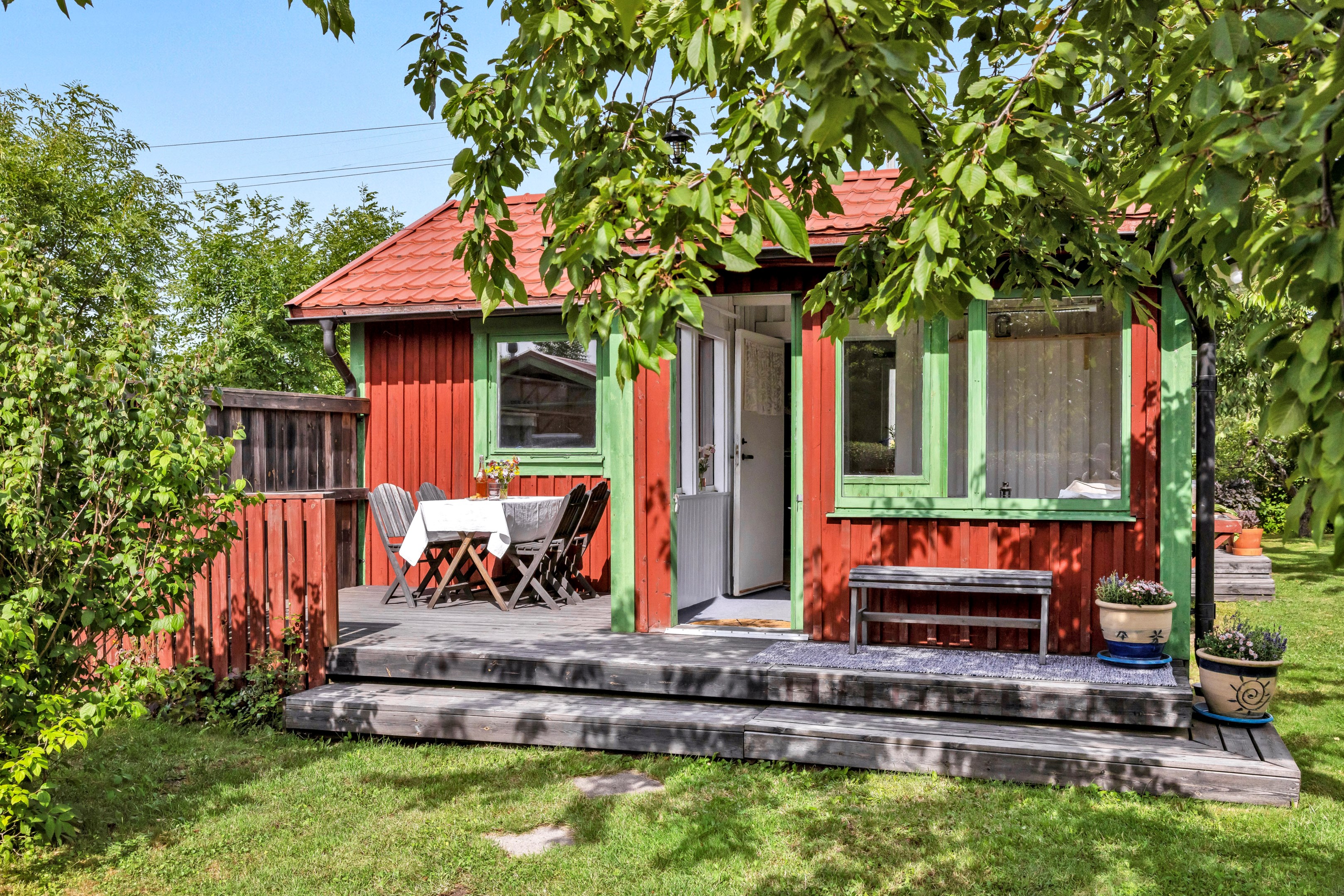 Bostadsbild från Husabyvägen 13 (Husbyborg koloniförening lott 13), Kommande i Husbyborg, Uppsala
