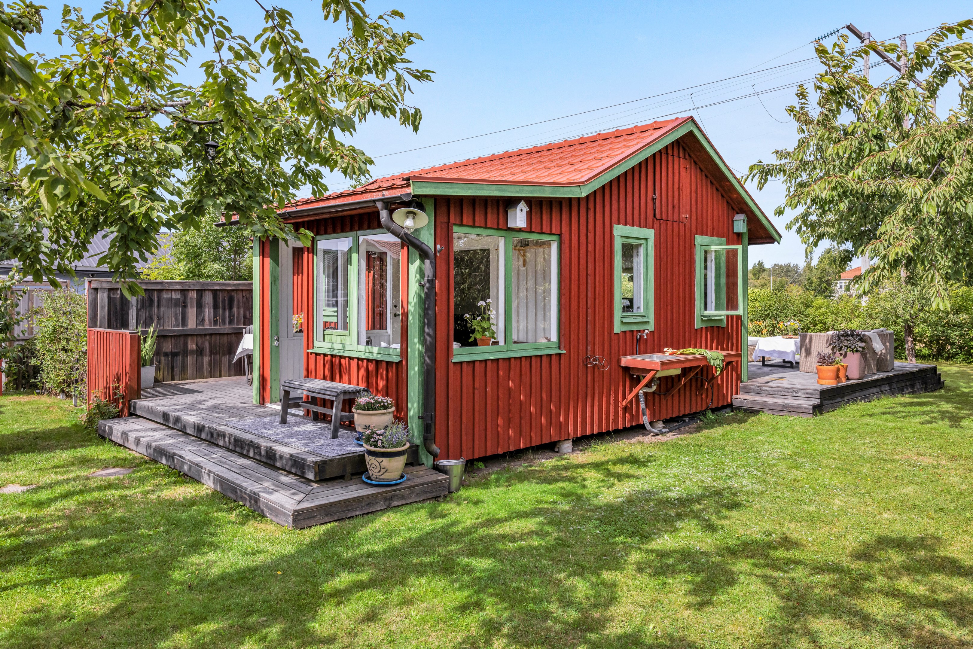 Bostadsbild från Husabyvägen 13 (Husbyborg koloniförening lott 13), Kommande i Husbyborg, Uppsala