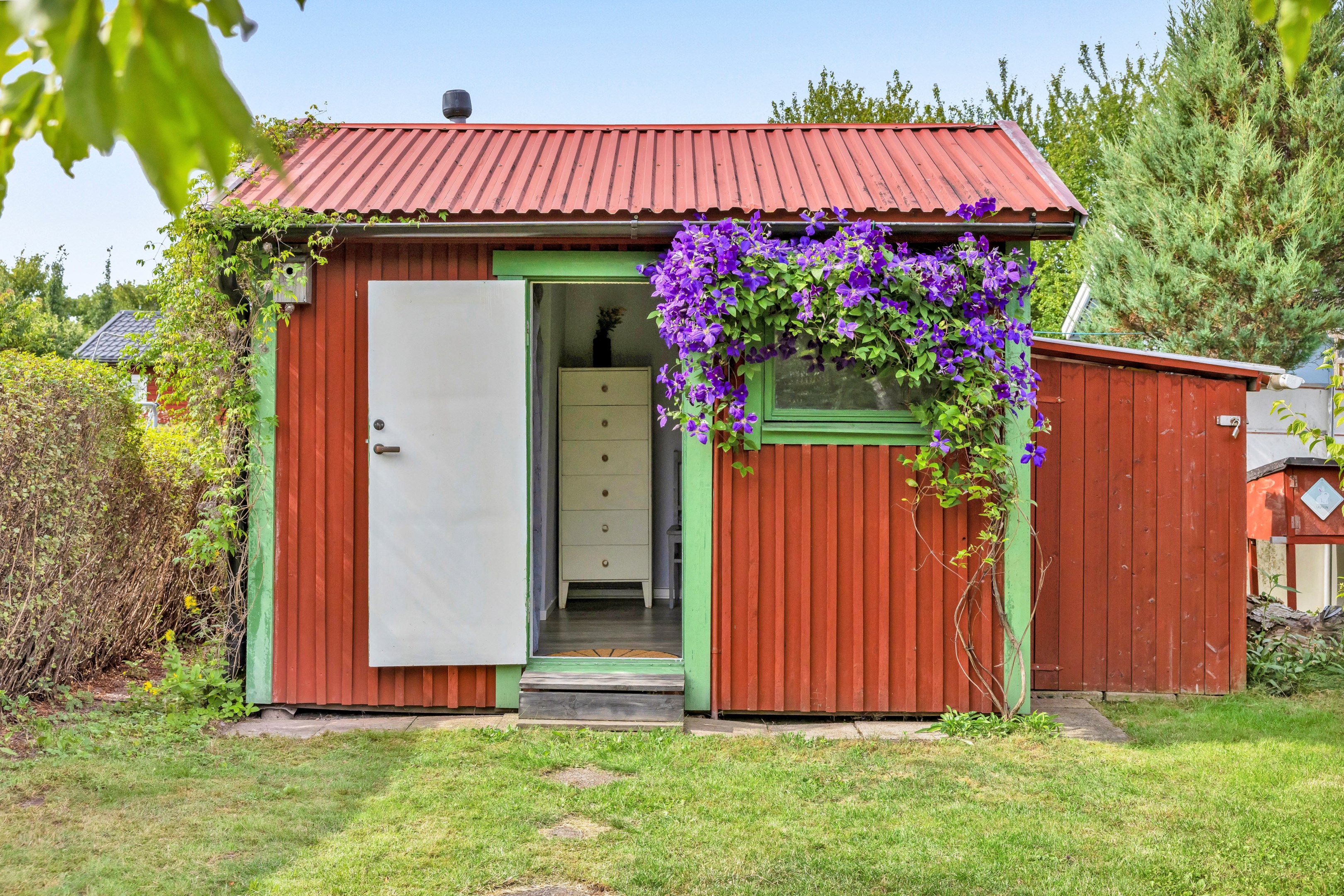 Bostadsbild från Husabyvägen 13 (Husbyborg koloniförening lott 13), Kommande i Husbyborg, Uppsala