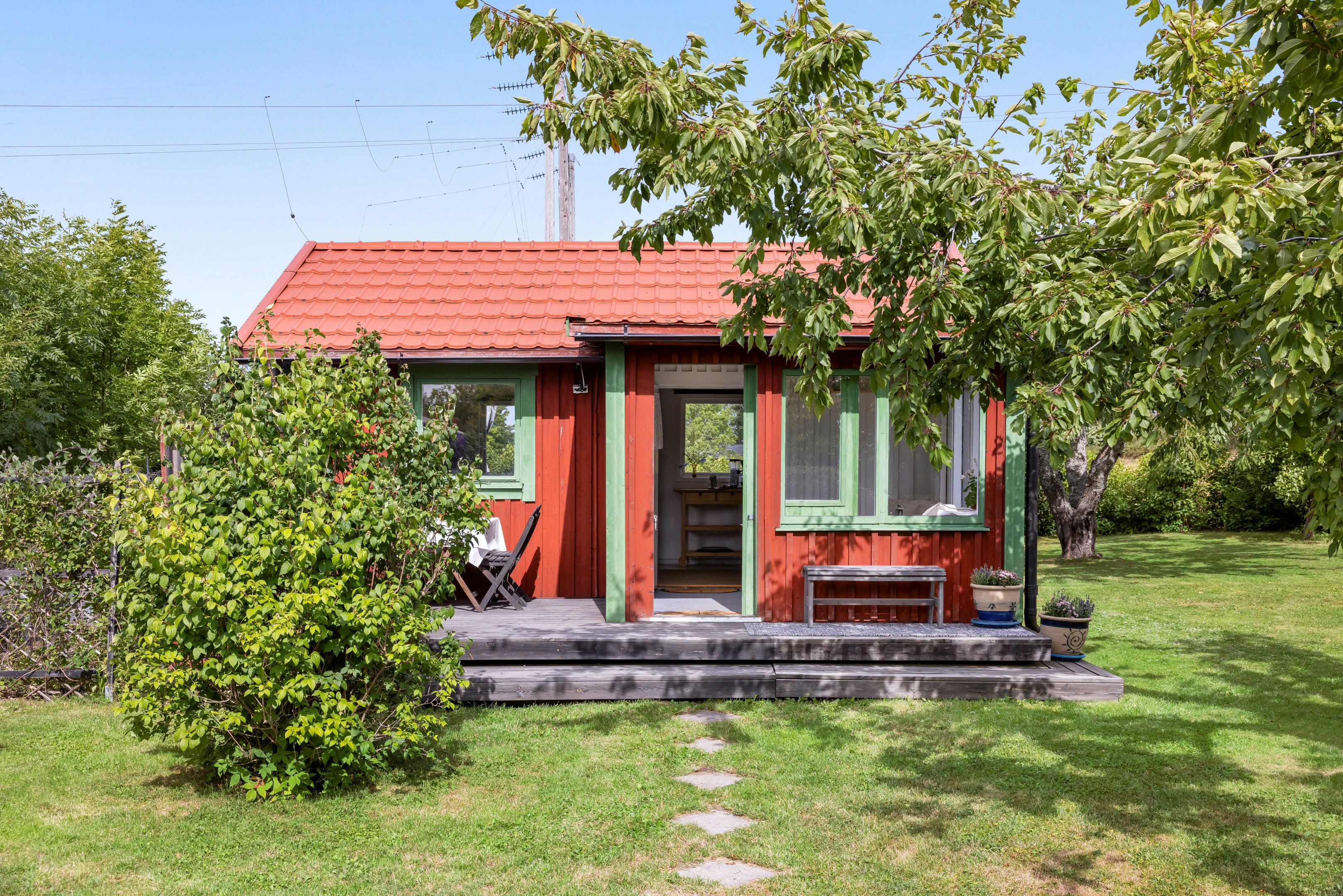 Bostadsbild från Husabyvägen 13 (Husbyborg koloniförening lott 13), Kommande i Husbyborg, Uppsala