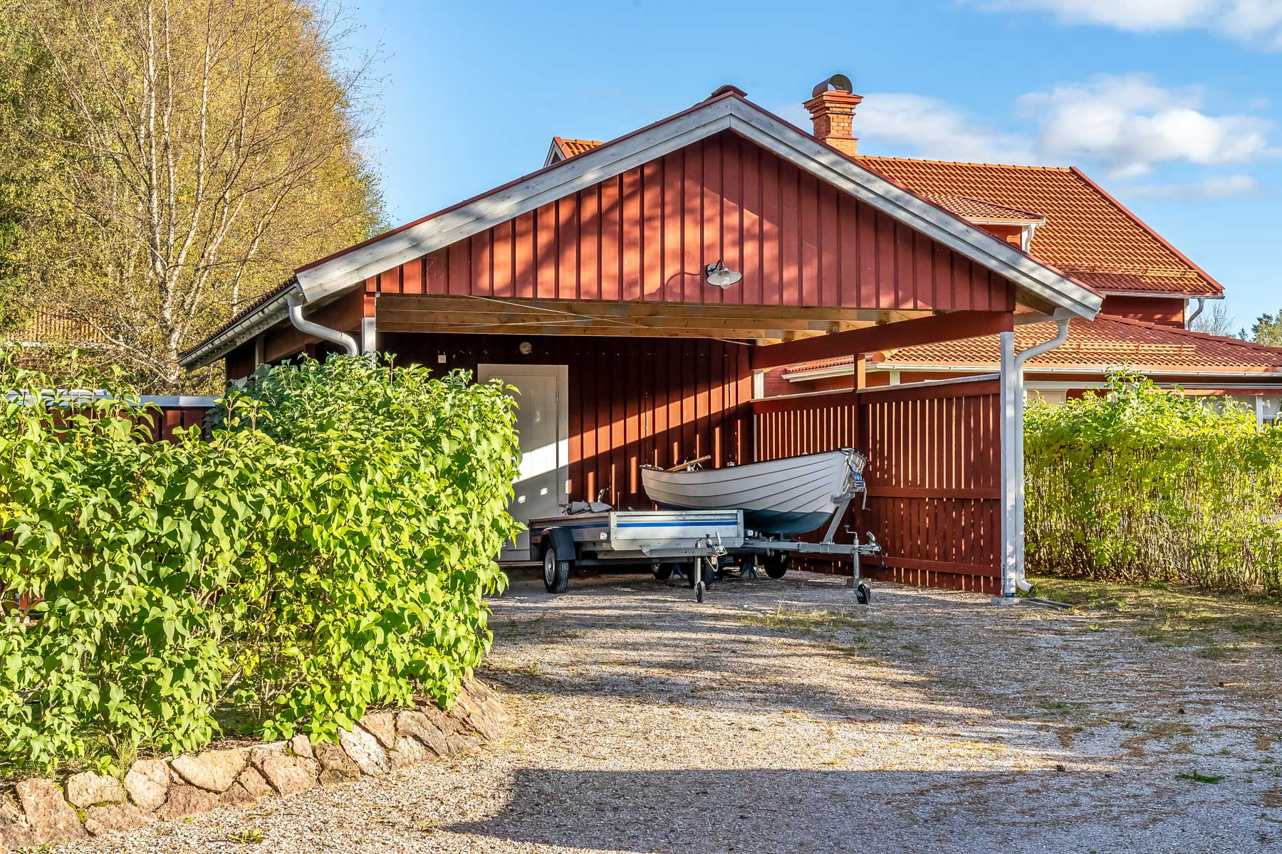 Carport med snickarbod