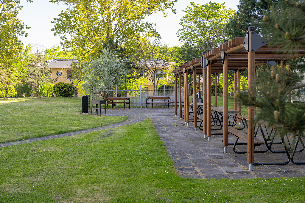 Fin uteplats med pergola