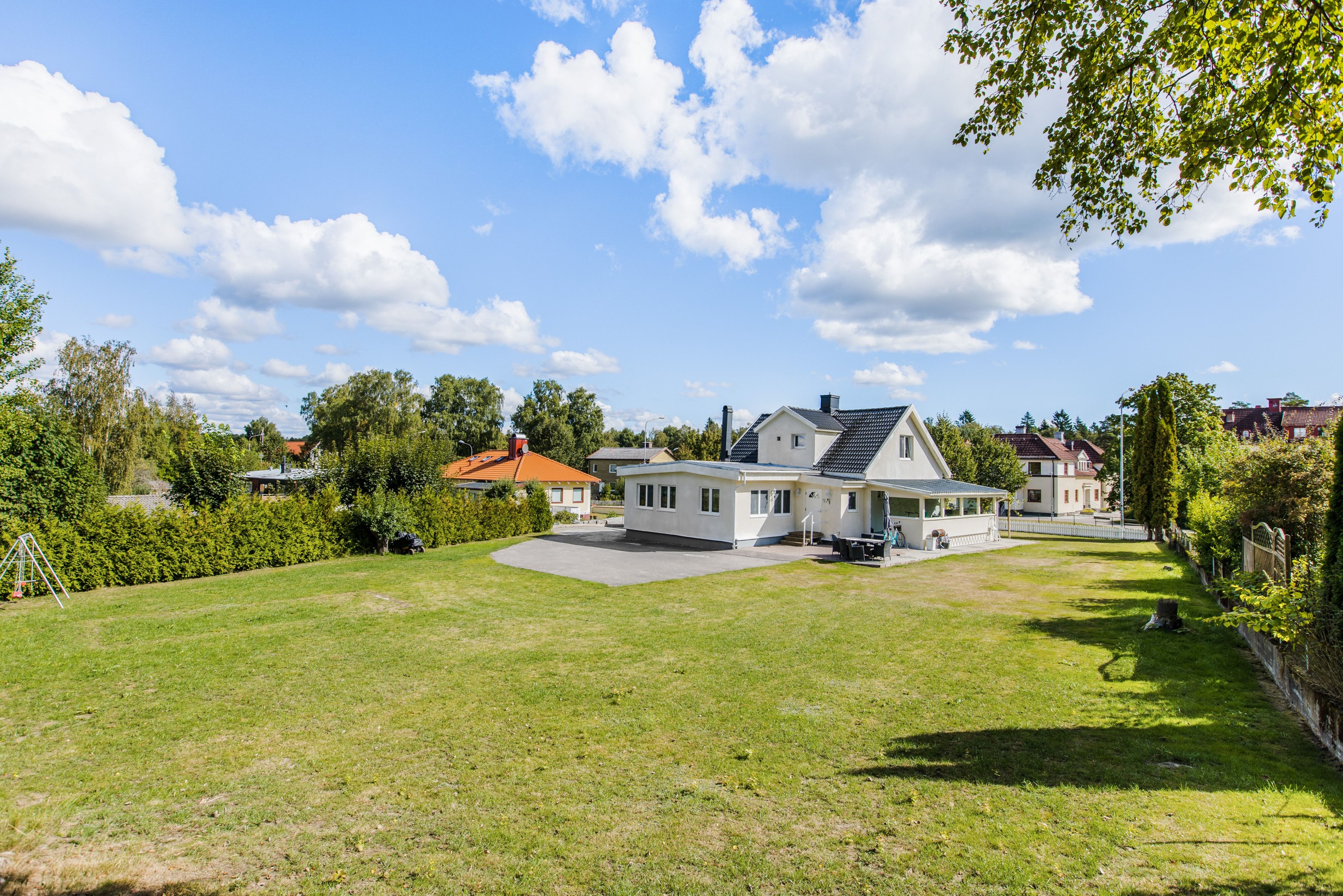 Trädgårdsbild, baksida.