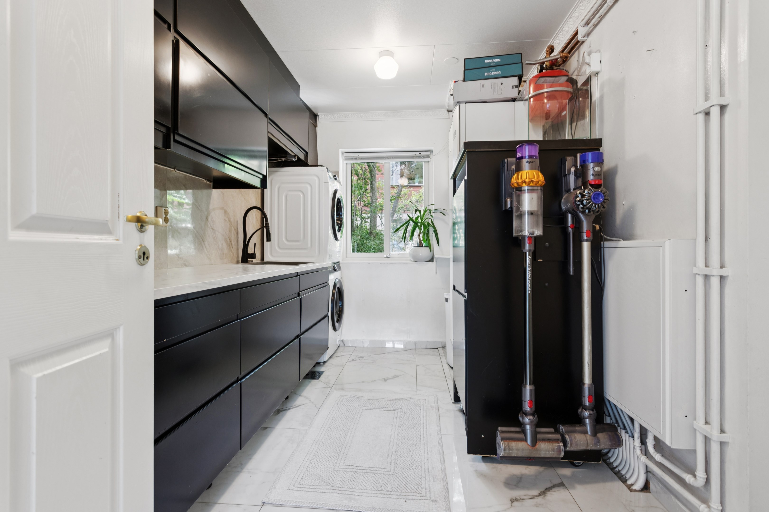 Tvättavdelning i anslutning till köket