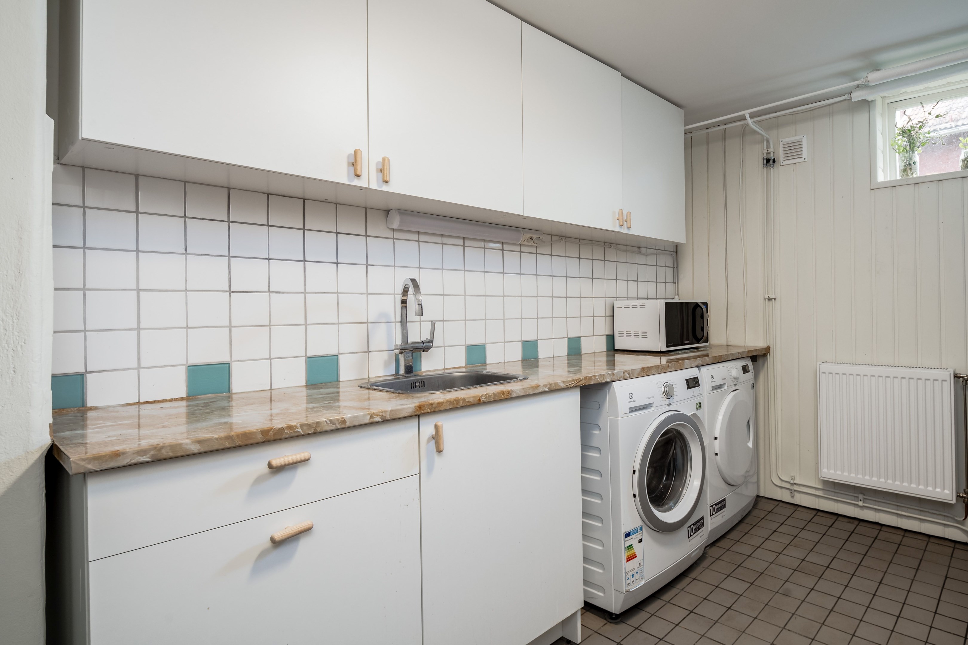 Tvättstuga med bastu och dusch