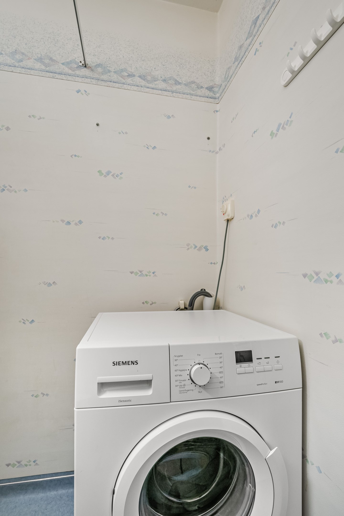 Tvättmaskin i badrum