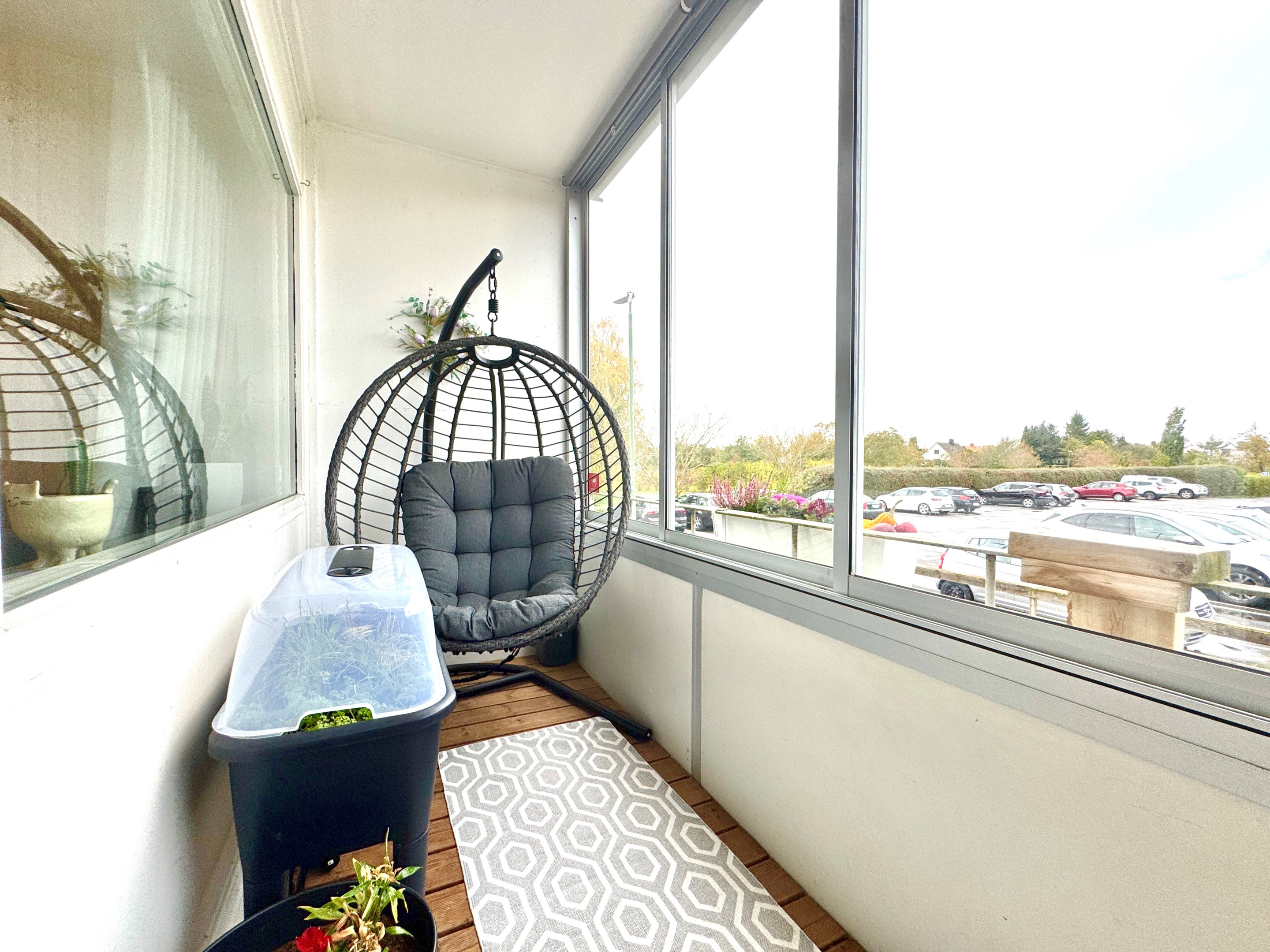 inglasad västerbalkong