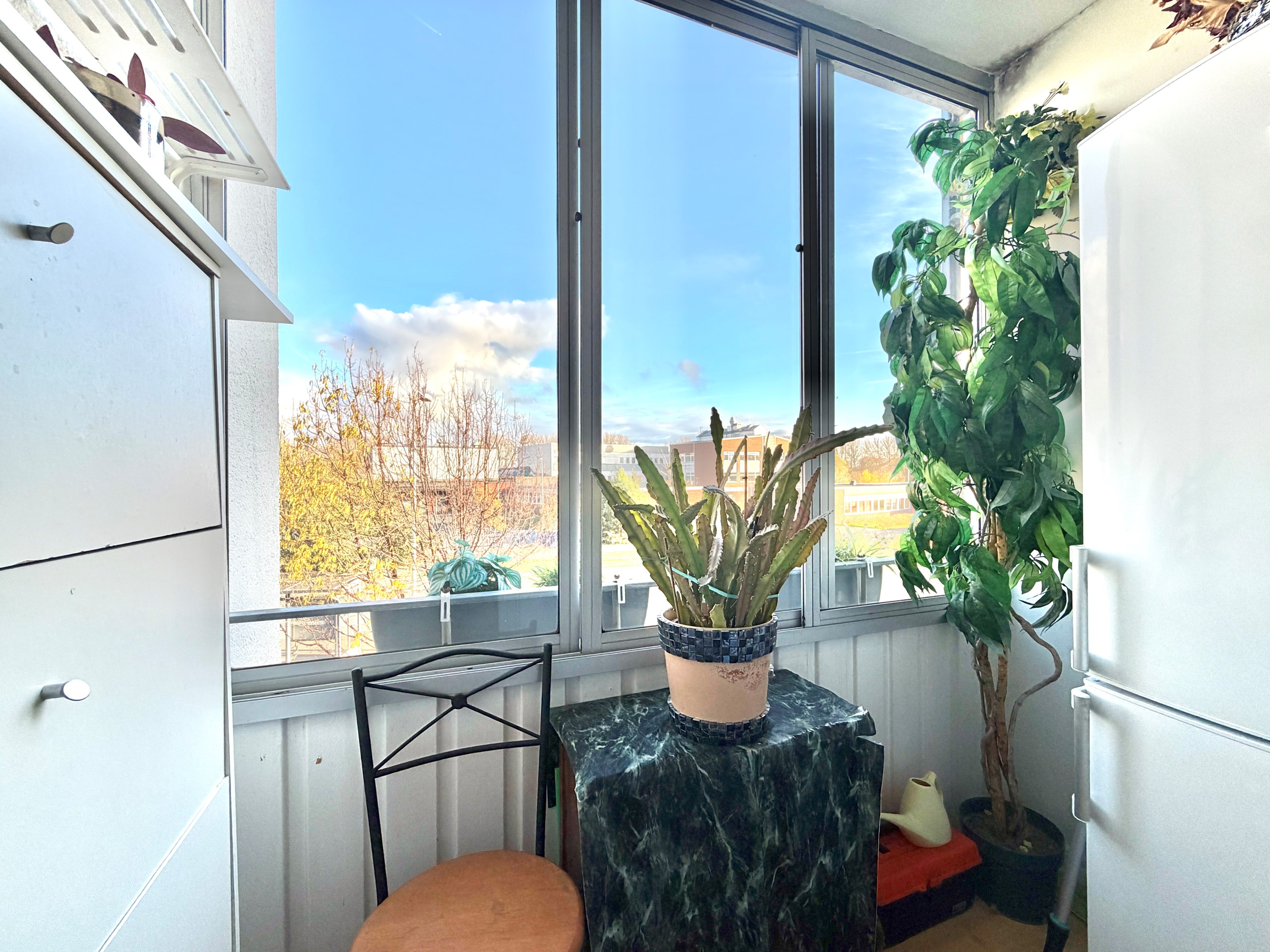 Inglasad balkong med utgång från v-rum