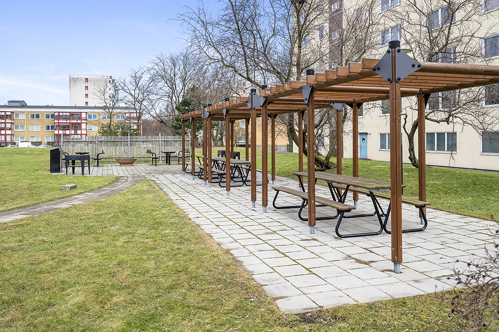 Uteplats under pergola