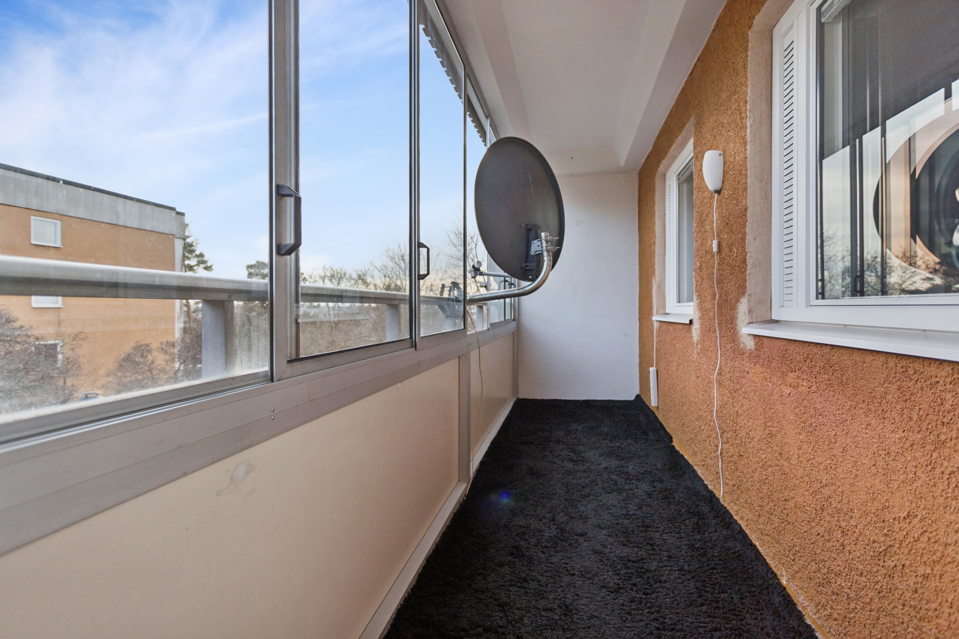 Stor inglasad balkong