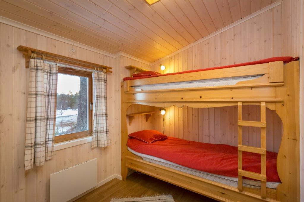 Praktiskt och mysigt sovrum med våningssäng