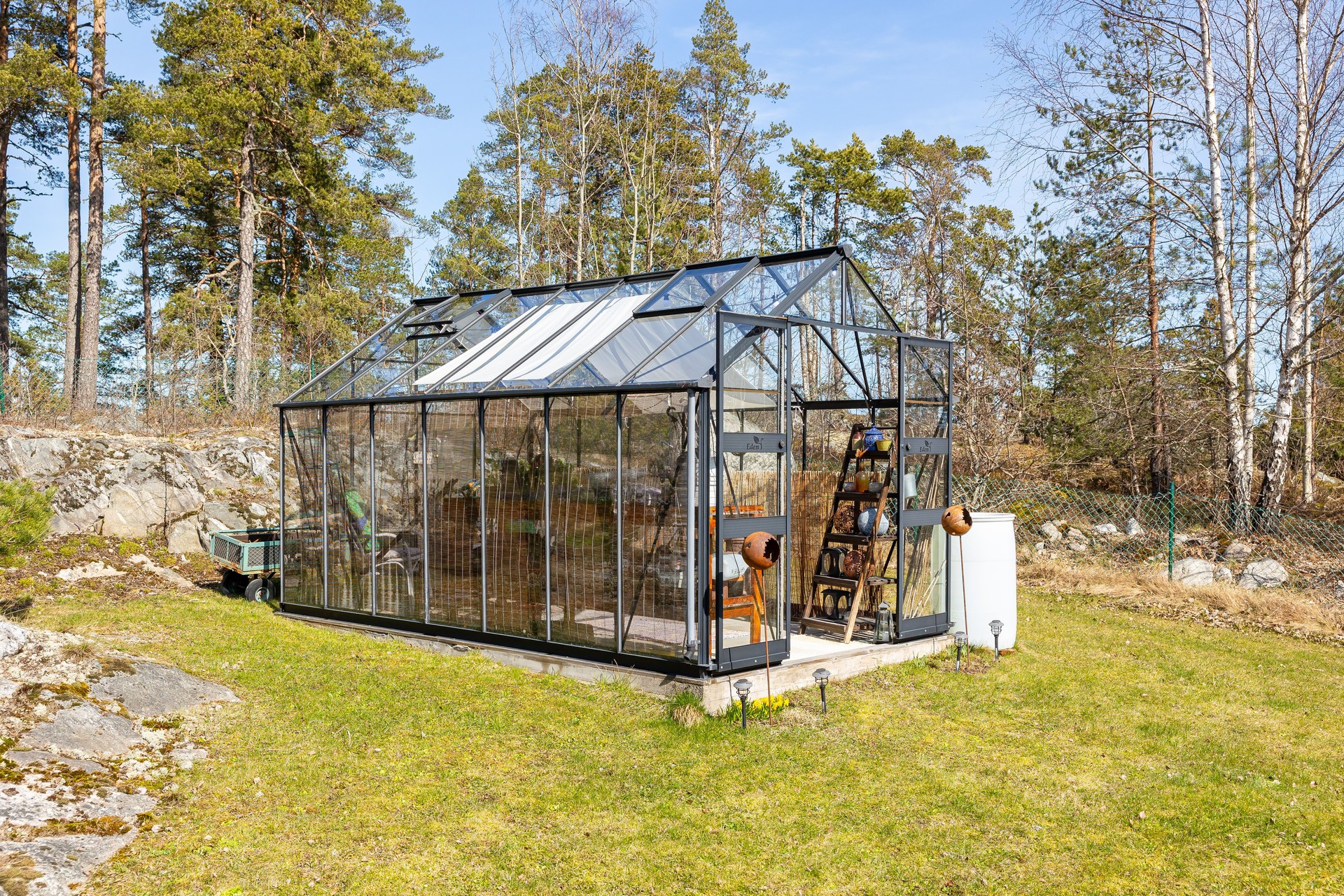 Jamen ett växthus att sitta i är mysigt