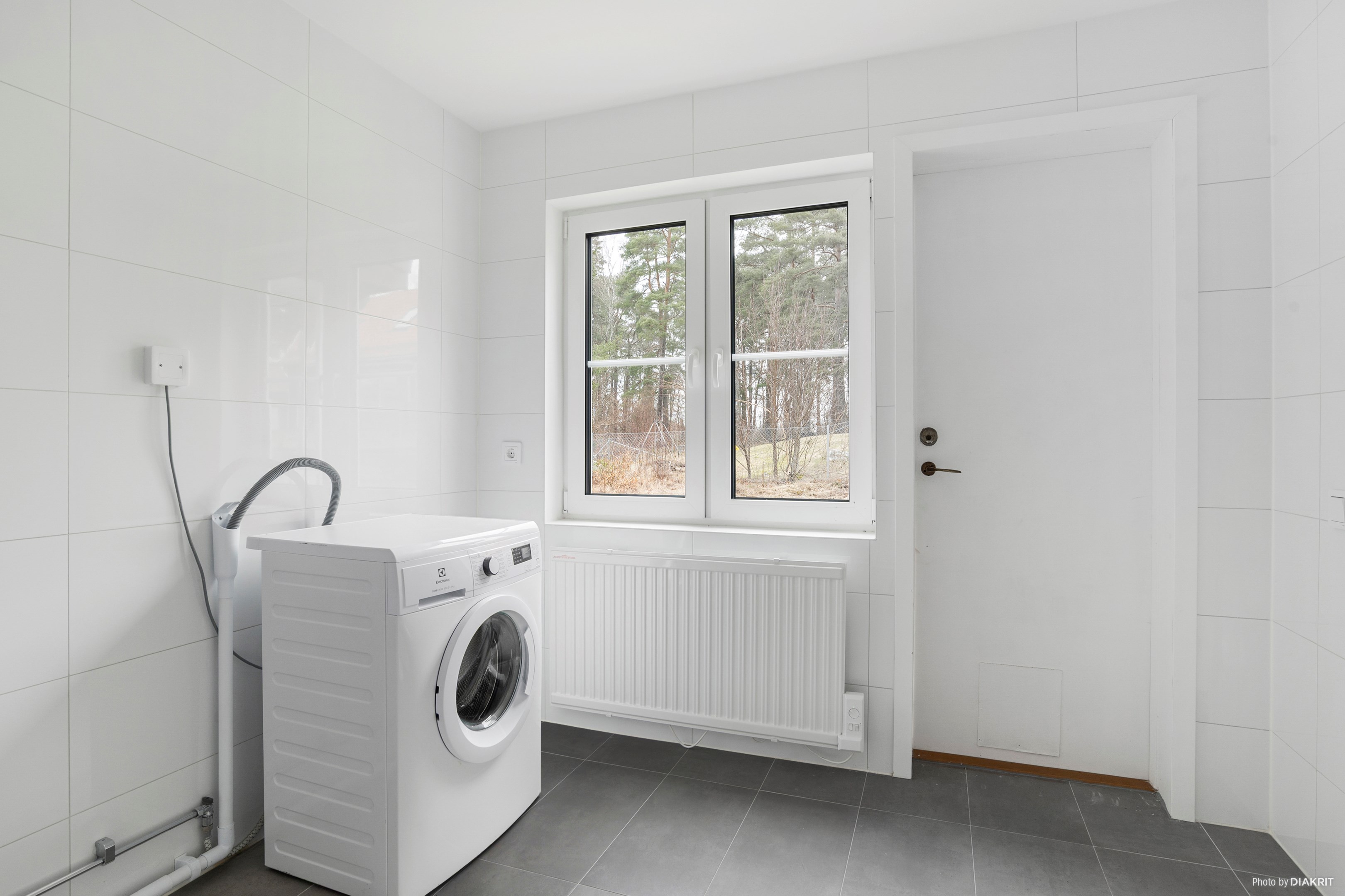 Tvättstugedel i badrum 1