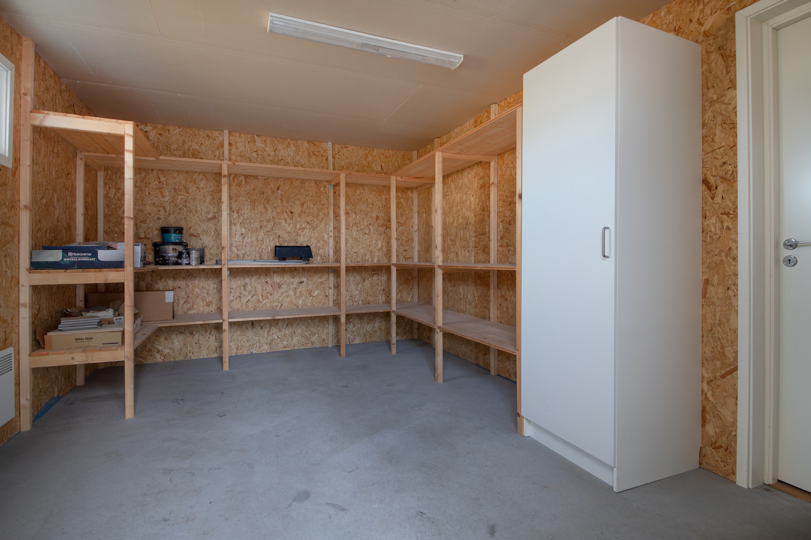 Förrådsdel i garagebyggnaden